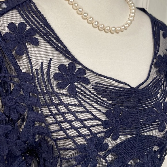 Express sheer unlined floral top in navy blue. - Picture 6 of 9